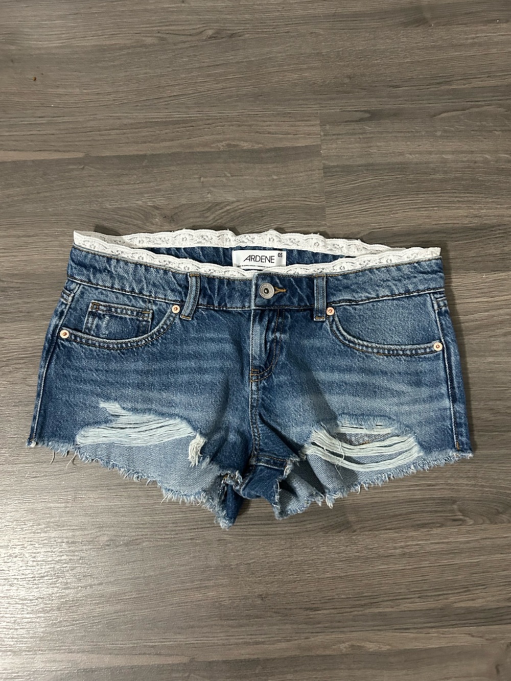 Ardene Mid Rise Denim Distressed Shorts with Lace Trim Medium Wash Festival